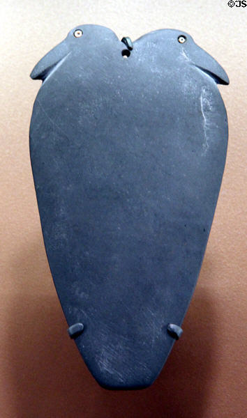 Egyptian eyepaint palette with double bird head (c3400-3100 BCE) rubbed for cosmetic or anti-glare pigments at Brooklyn Museum. Brooklyn, NY.