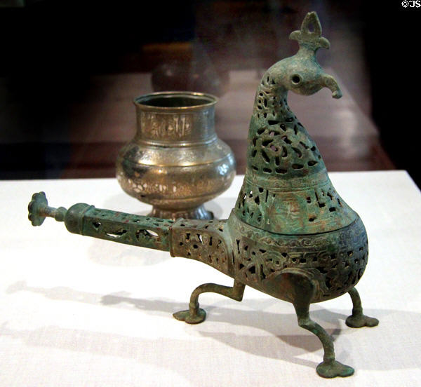 Copper alloy incense burner in shape of bird (12-13th C) from Iran at Brooklyn Museum. Brooklyn, NY.
