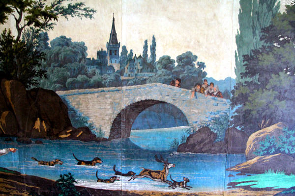 Detail of hounds chasing cerf beside arched bridge on "Paysages à Chasse" wallpaper (1830-40) by Zuber Cie. of France in dining room at Lindenwald. Kinderhook, NY.