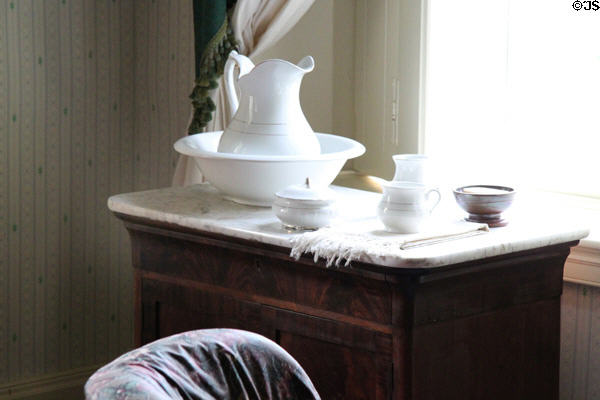 Pitcher & basin on marble-topped washstand (1830-40) in Martin Van Buren's bedroom at Lindenwald. Kinderhook, NY.