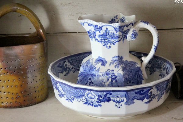 Pitcher & wash basin with blue transfer print scenes in Layton General Store at Old Bethpage Village. Old Bethpage, NY.