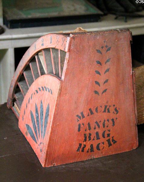 Mack's Fancy Bag Rack for dispensing paper bags in Layton General Store at Old Bethpage Village. Old Bethpage, NY.