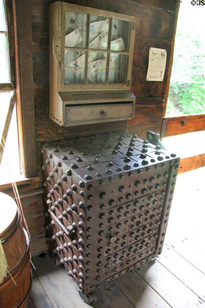 Safe covered with rivets in Luyster Store at Old Bethpage Village. Old Bethpage, NY.