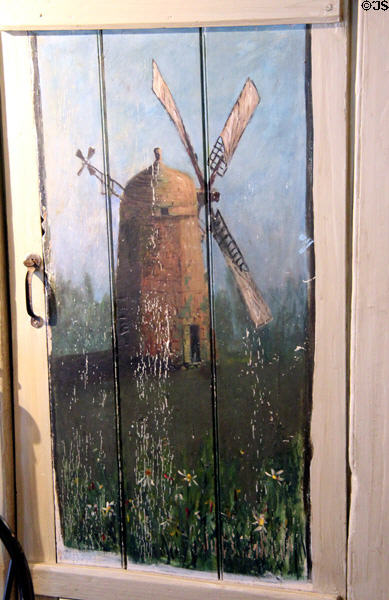 Windmill in a field painted on door by Annie Cooper Boyd at Boyd House museum. Sag Harbor, NY.