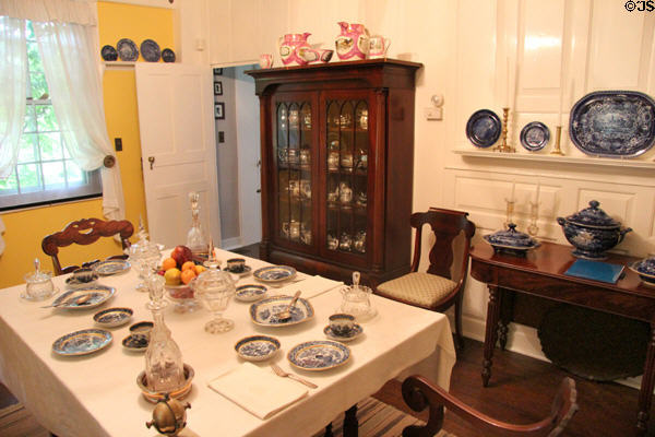 Dining table & vintage display cabinet at Home Sweet Home Museum. East Hampton, NY.