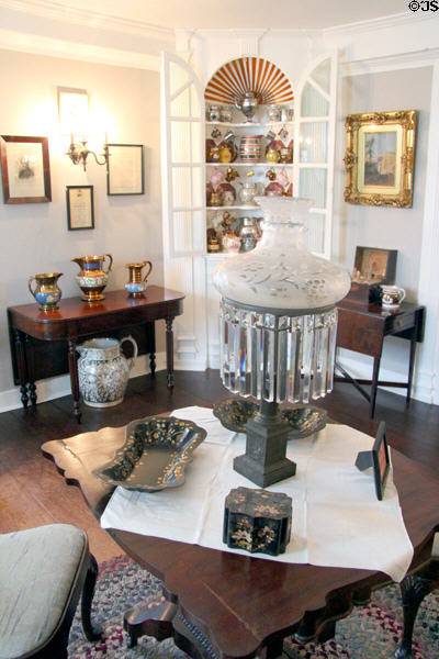 Parlor with crystal oil lamp & lusterware collection at Home Sweet Home Museum. East Hampton, NY.