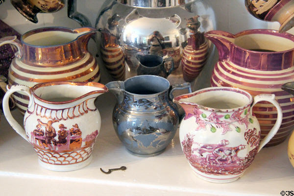Array of lusterware pitchers in pink & blue at Home Sweet Home Museum. East Hampton, NY.