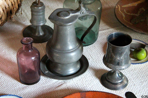 Pewter covered pitcher, beaker & antique bottles at Thomas Halsey Homestead. South Hampton, NY.