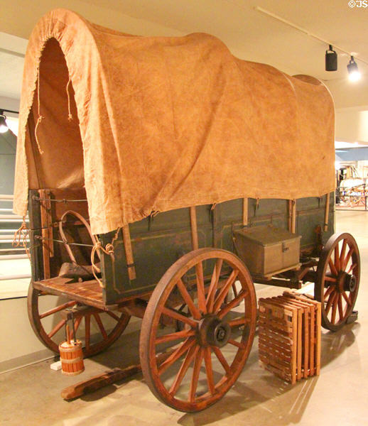 Covered wagon at carriage collection of Long Island Museum. Stony Brook, NY.