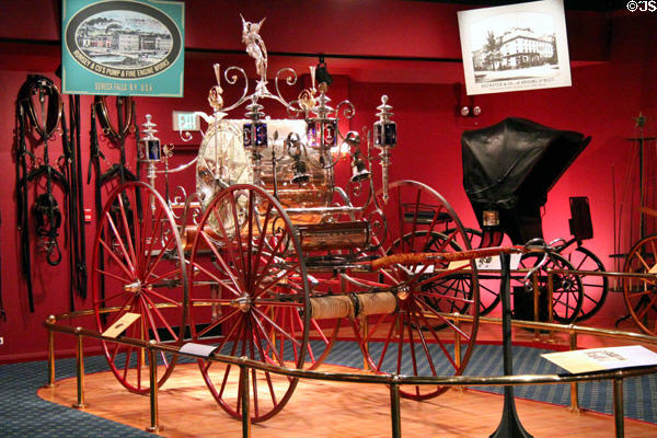 Fire company's parade hose carriage (1875) by Rumsey Manuf. Co. of Seneca Falls, NY at carriage collection of Long Island Museum. Stony Brook, NY.