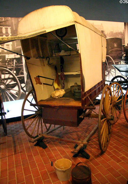 Butcher's wagon (c1912) a door-to- door meat market on wheels used ice boxes at carriage collection of Long Island Museum. Stony Brook, NY.