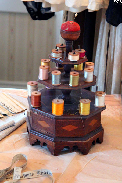 Thread spool holder with pin cushion in sewing room at Roosevelt's Sagamore Hill NHS. Cove Neck, NY.