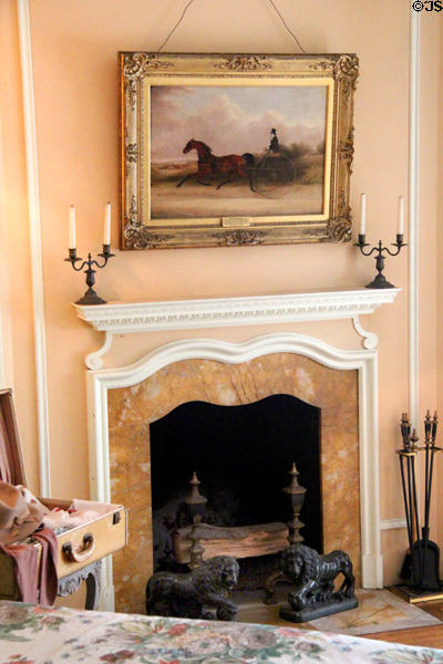 Peach guest room fireplace with horse cart painting of Lord William at Vanderbilt Mansion. Centerport, NY.