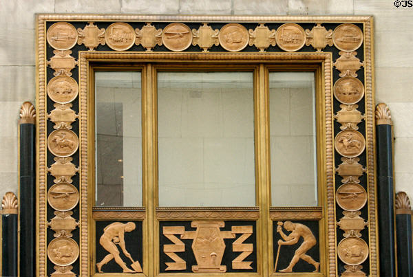 Art Deco portal of Carew Tower with medallions of progress in horse, steamboat, rail & air transport. Cincinnati, OH.