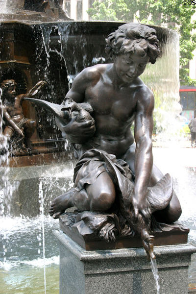 Detail of boy with spouting goose part of Tyler Davidson Fountain in Fountain Square. Cincinnati, OH.