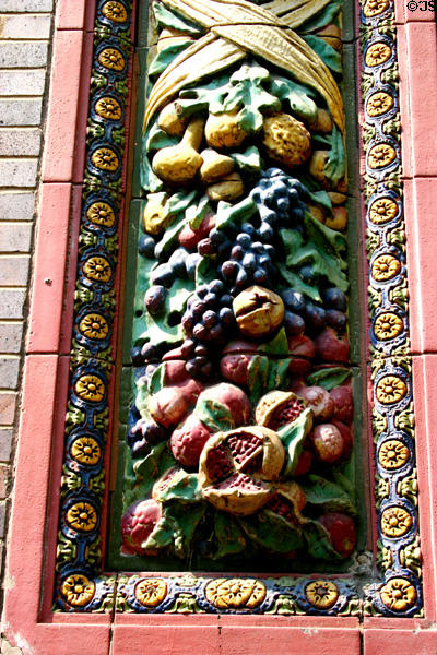 Rookwood Pottery tiles showing grapes, pears, pomegranates (10-12 W 4th St.). Cincinnati, OH.