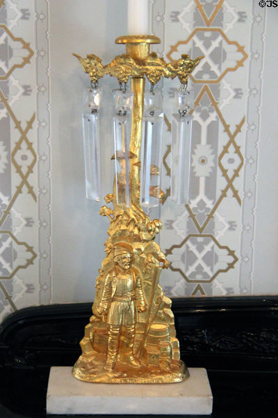 Gilt girandole with relief of smuggler Dirk Hatteraick from novel by Sir Walter Scott at Taft House NHS. Cincinnati, OH.