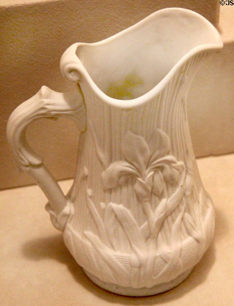 Stoneware white pitcher with iris (1875-81) from Frederick Dallas Hamilton Road Pottery at Cincinnati Art Museum. Cincinnati, OH.