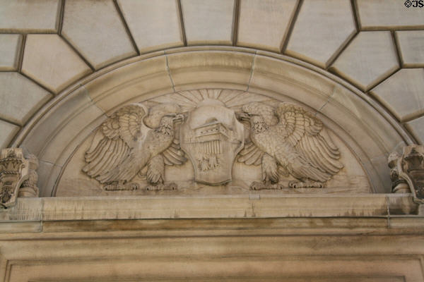 Two eagles flank frontier fort over portal of Huntington Building. Toledo, OH.