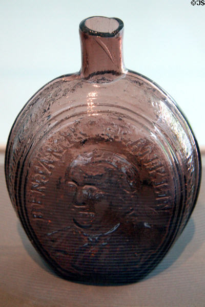 Mold blown glass flask with bust of Benjamin Franklin (1824-38) from Kensington, PA at Toledo Glass Pavilion. Toledo, OH.