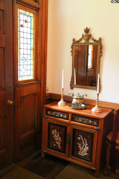 Ornate cupboard under mirror inside side door of Hayes Presidential Home. Fremont, OH.