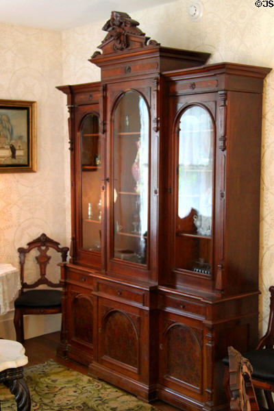 China cabinet in parlor of Sayles House at Milan Historical Museum. Milan, OH.