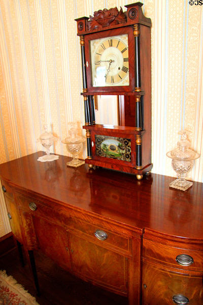 Mantle clock (c1825) & sweetmeat jars on reproduction sideboard (c1925-40) in dining room of Monroe House at Oberlin Heritage Center. Oberlin, OH.