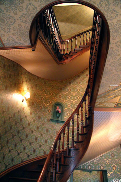 Stairwell with wallpaper recreated to a design by William Morris at Ida Saxton McKinley Historic House. Canton, OH.