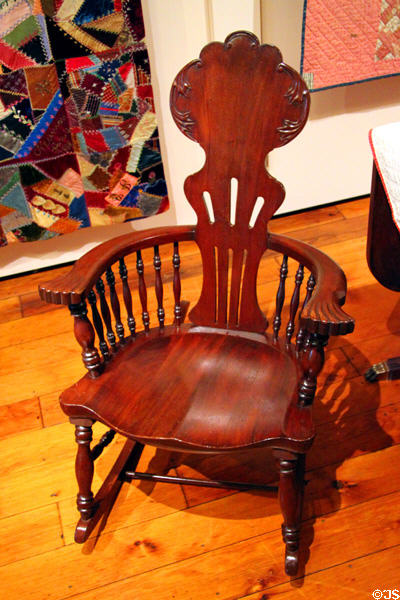 Wooden rocking chair with head rest at Hower House. Akron, OH.
