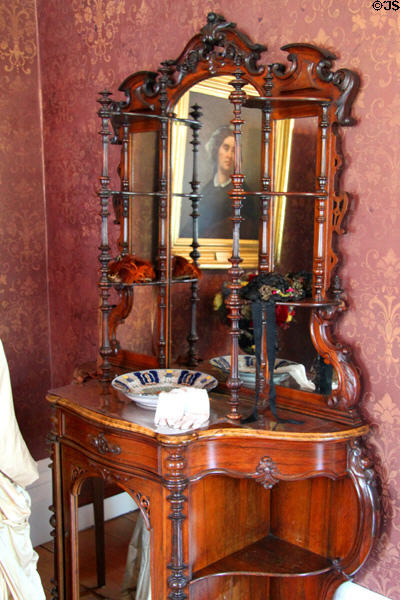 Cabinet with mirror in parlor at Col. Simon Perkins Stone Mansion. Akron, OH.
