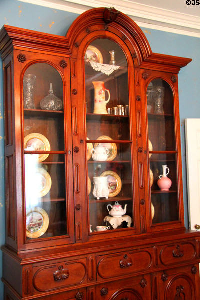China cabinet in dining room at Col. Simon Perkins Stone Mansion. Akron, OH.
