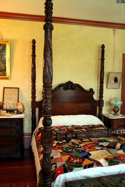 Four poster bed with crazy quilt at Col. Simon Perkins Stone Mansion. Akron, OH.