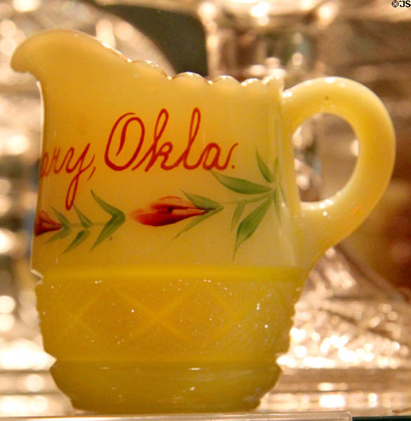 Custard color glass souvenir creamer marked Geary, Okla in Cut Block pattern (#1200) at National Heisey Glass Museum. Newark, OH.