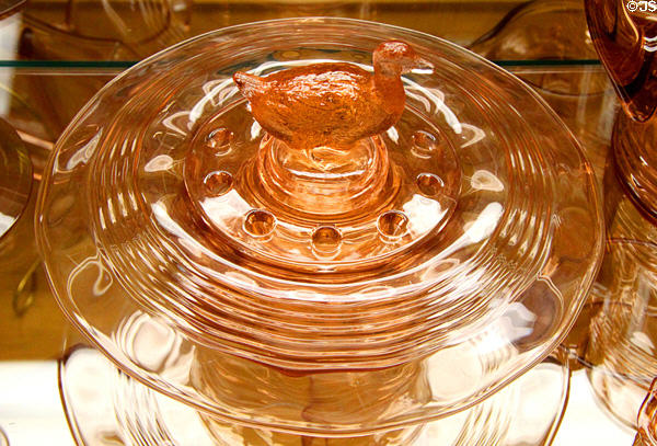 Duck flower frog & bowl in Flamingo color at National Heisey Glass Museum. Newark, OH.