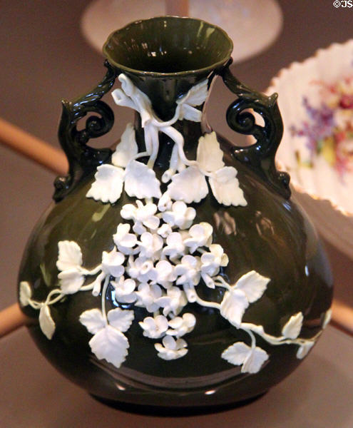 Olive green Umbrian Vase with applied flowers at Museum of Ceramics. East Liverpool, OH.