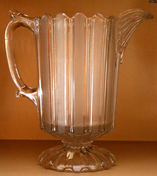 Footed glass pitcher from Zanesville area at Stone Academy Museum. Zanesville, OH.