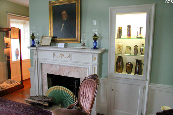 Parlor displaying glass & ceramics at Mathews House Museum. Zanesville, OH.