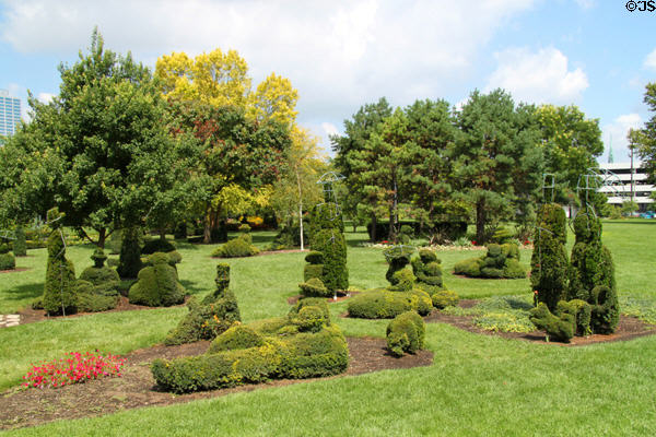 Topiary figures lounge in French Topiary Garden after painting by Georges Seurat. Columbus, OH.