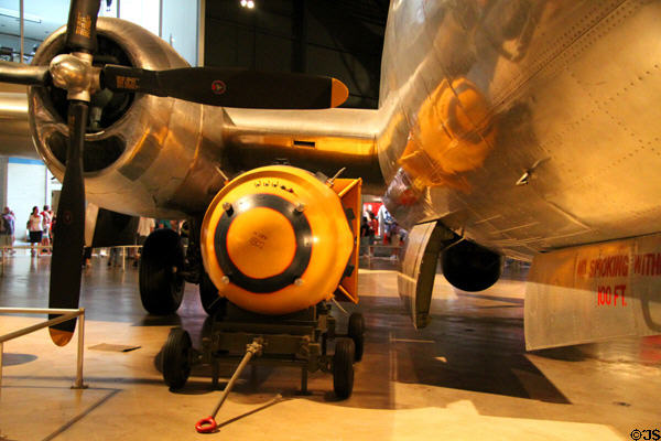 Fat Man atomic bomb model under Boeing B-29 Superfortress (1942) bomber at National Museum of USAF. Dayton, OH.