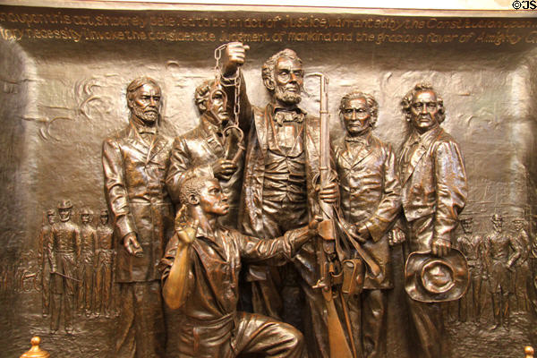 Relief of Emancipation of Slaves shows abolitionists John Sherman, Salmon P. Chase, Dan. R. Field, Abraham Lincoln, Benjamin F. Wade, Joshua R. Giddings in Cleveland's Soldiers' & Sailors' Monument. Cleveland, OH.