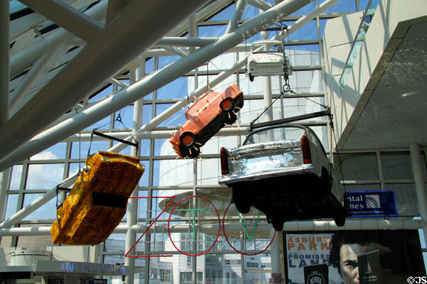 Decorated Trabant cars hang in lobby of Rock & Roll Hall of Fame. Cleveland, OH.