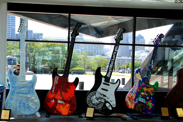 Collection of Guitar Mania painted guitars in Rock & Roll Hall of Fame. Cleveland, OH.