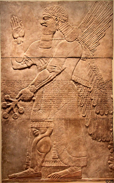 Assyrian relief of Saluting Protective Spirit (883-859 BCE) from Nimrud Northwest Palace at Cleveland Museum of Art. Cleveland, OH.