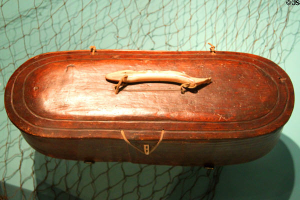 Inuit bentwood toolbox with ivory fish handle (19thC) from Alaska at Cleveland Museum of Natural History. Cleveland, OH.
