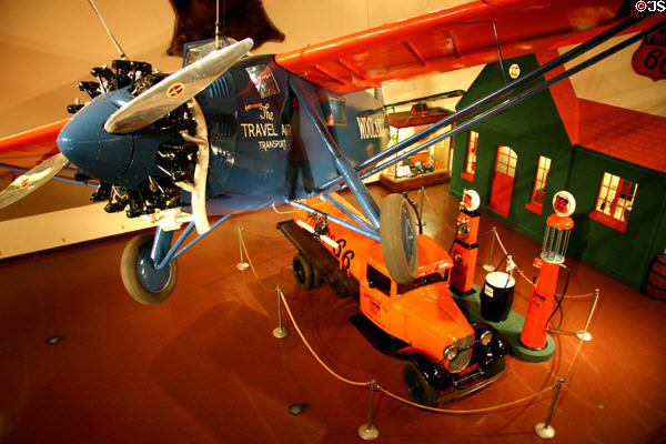 Woolaroc 1927 racing monoplane plus Phillips 66 1920's oil tanker truck at Woolaroc Museum. Bartlesville, OK.