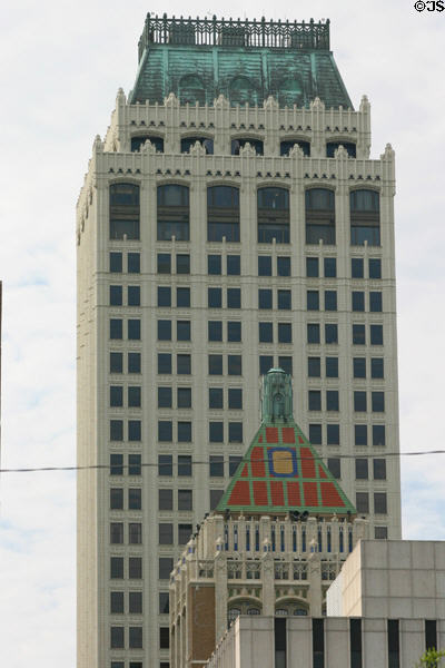 Mid-Continent Tower over red Philtower tiled roof. Tulsa, OK.