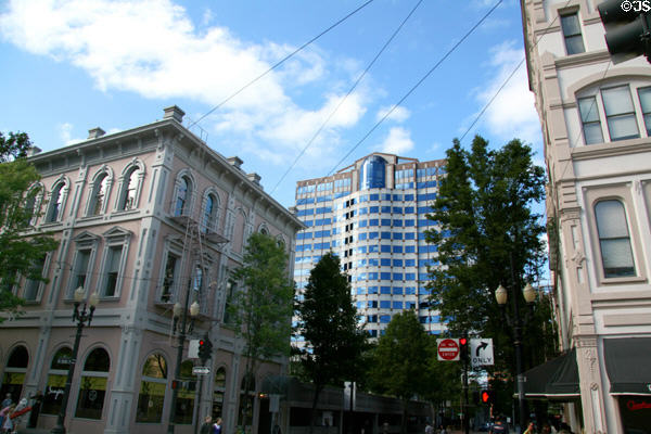 Heritage commercial buildings (at SW 1st Ave. & Yamhill) frame Bank of America Center. Portland, OR.
