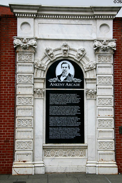 Ankeny Arcade monument with antique cast iron arch. Portland, OR.