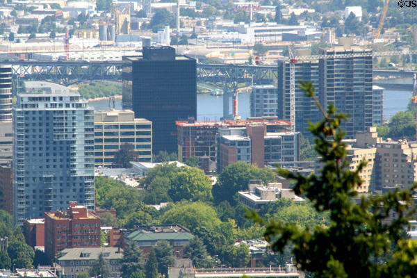 Skyline of residential towers at southern end of downtown Portland against I-5 Bridge. Portland, OR.