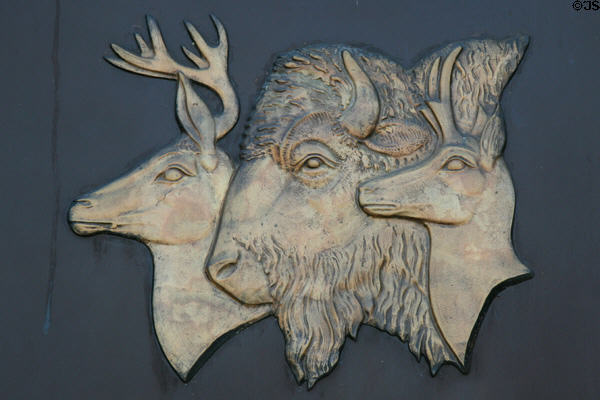 Elk, buffalo & antelope on metal insert over door of Oregon State Capitol. Salem, OR.